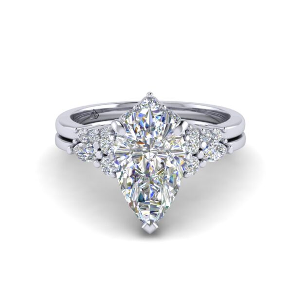 nara - side stone engagement ring with platinum metal and pear shape diamond