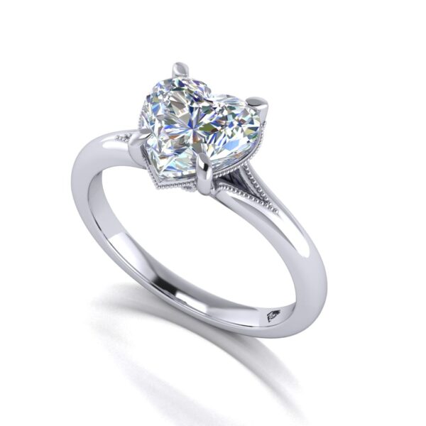 ruby - engagement ring with platinum metal and heart shape diamond