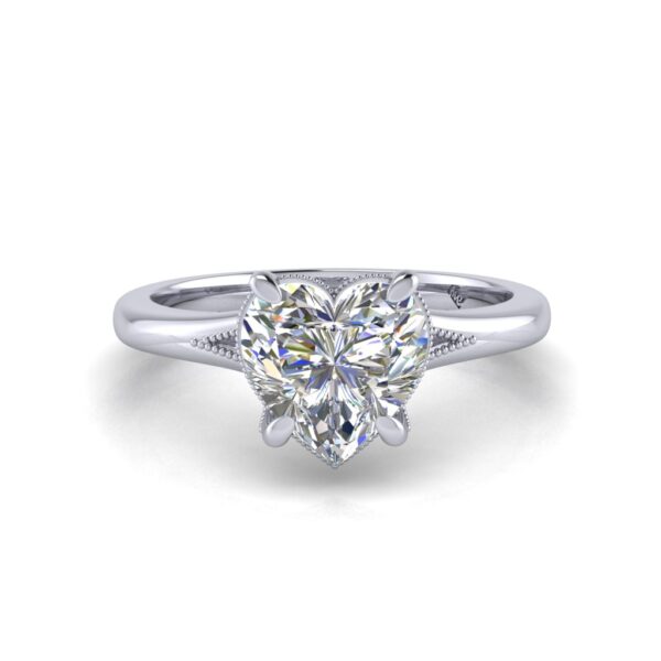 ruby - engagement ring with platinum metal and heart shape diamond