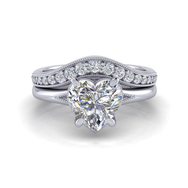 ruby - engagement ring with platinum metal and heart shape diamond